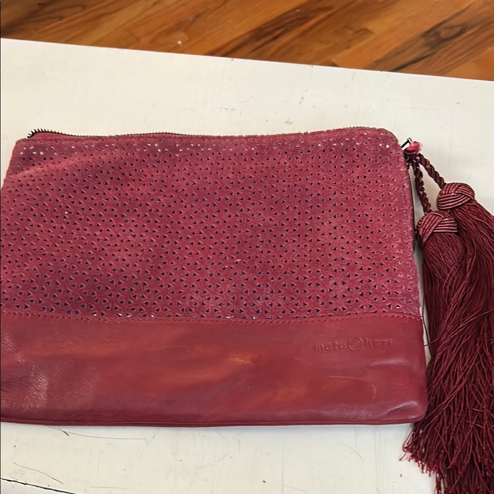 Chic Red Clutch with Tassel and wristlet.By: Mata Hari great finishing touches